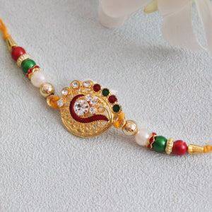 Gleaming Stone Studded Golden Rakhi