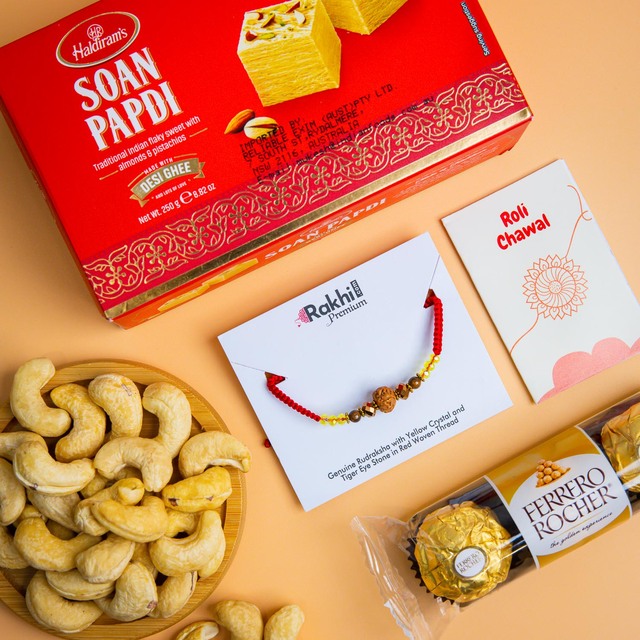 Premium Rudraksh Rakhi with Ferrero Rocher, Cashews And Soan Papdi - For Australia
