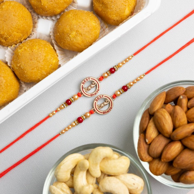 Two Beautiful Rakhi With Sweets & Nuts - For New Zealand
